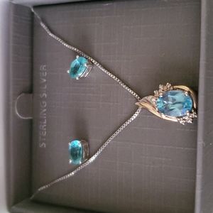 10 kt gold & Sterling silver necklace and earrings with blue topaz.